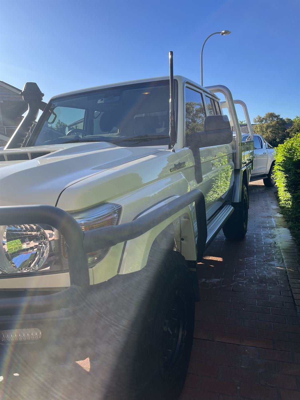 White LandCruiser 79 Series after an exterior detail